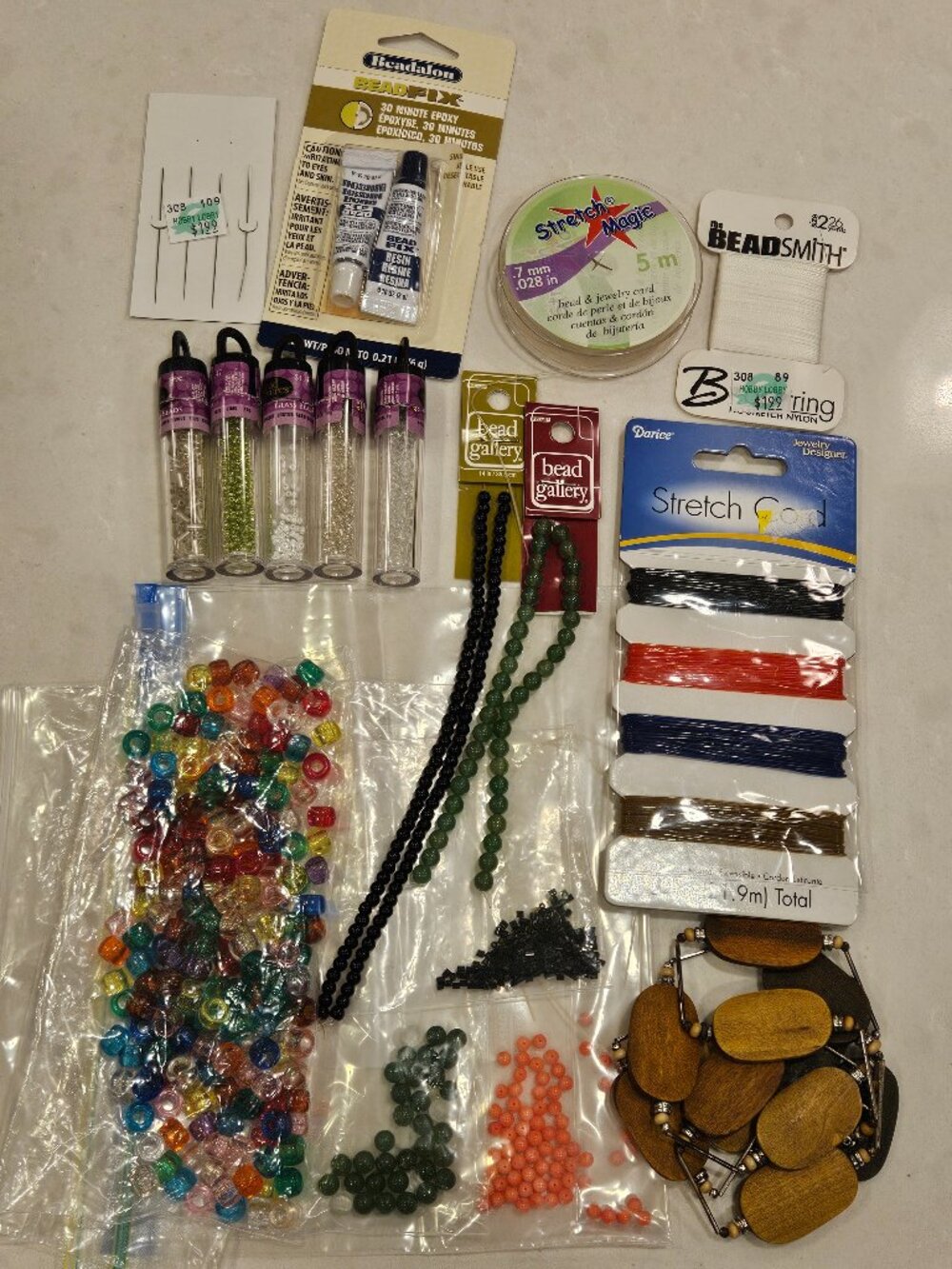 Bead Treasures + Mix of misc glass, plastic & semi-precious stone beads + String